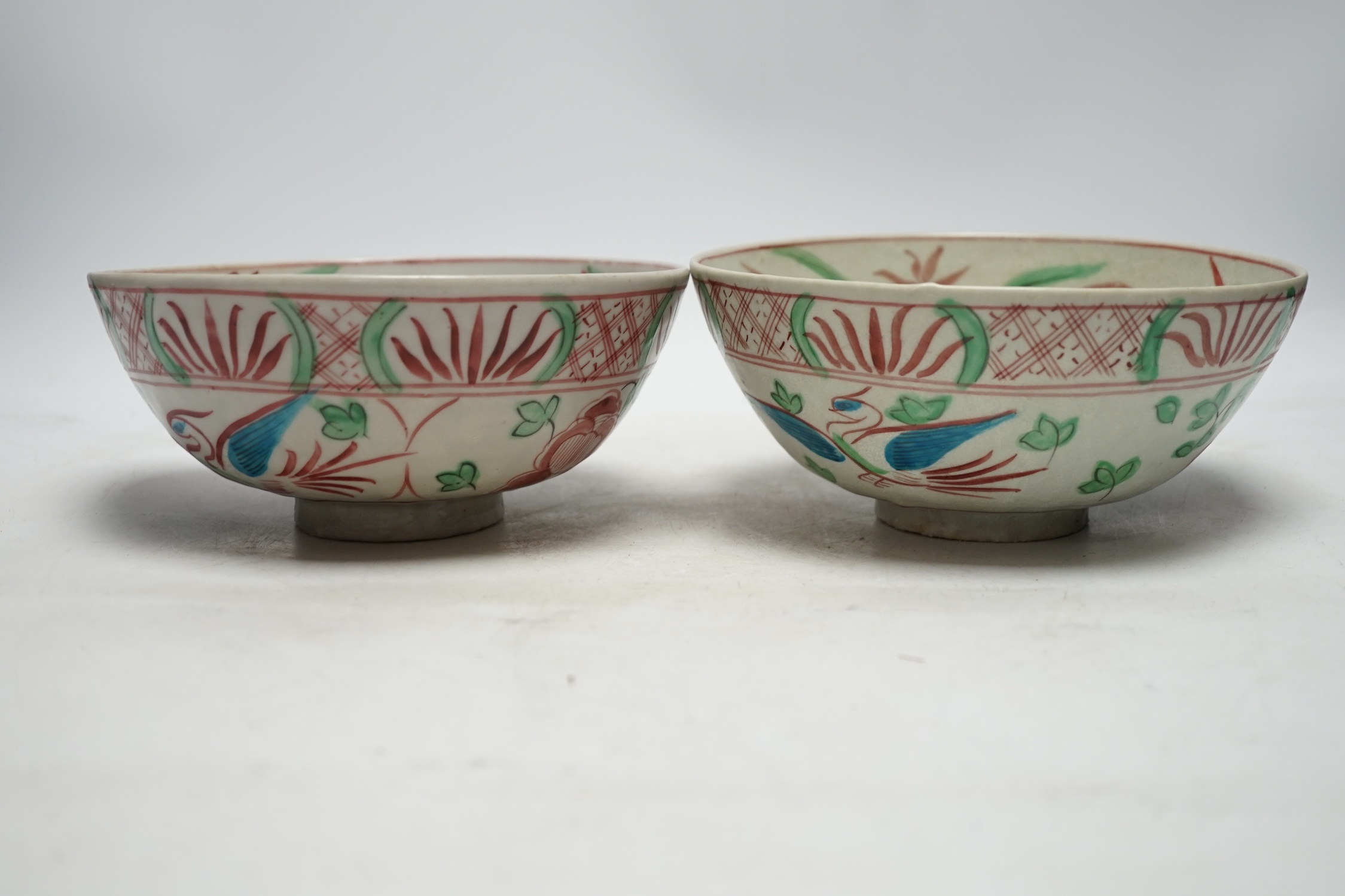 A pair of Chinese Swatow bowls, late 16th century, 19.5cm diameter